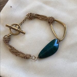 One of a kind gold bracelet with green stone